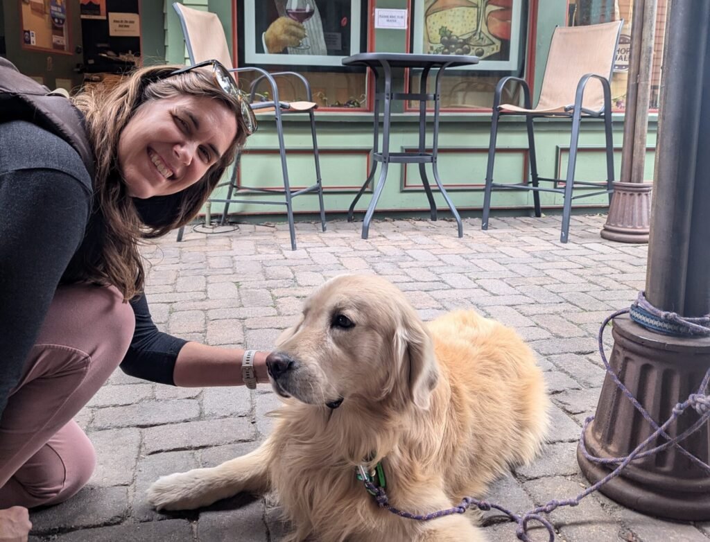 Adele Sloan and random dog, climate fiction book reviewer